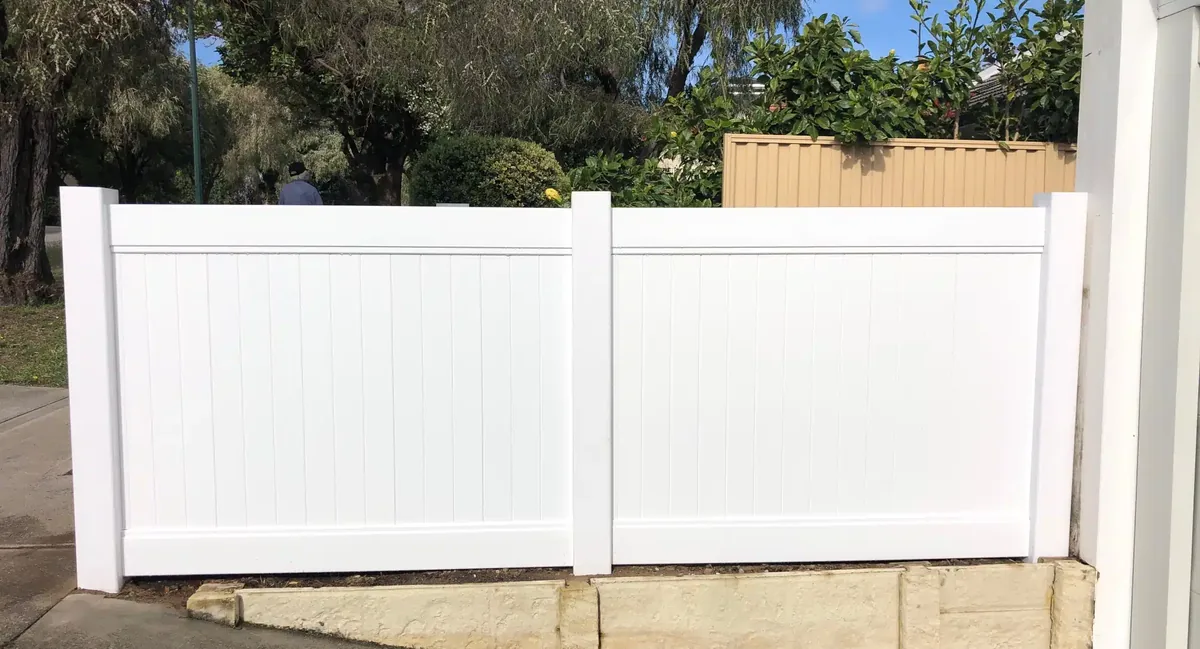 White PVC privacy fence along a residential boundary in Cottesloe